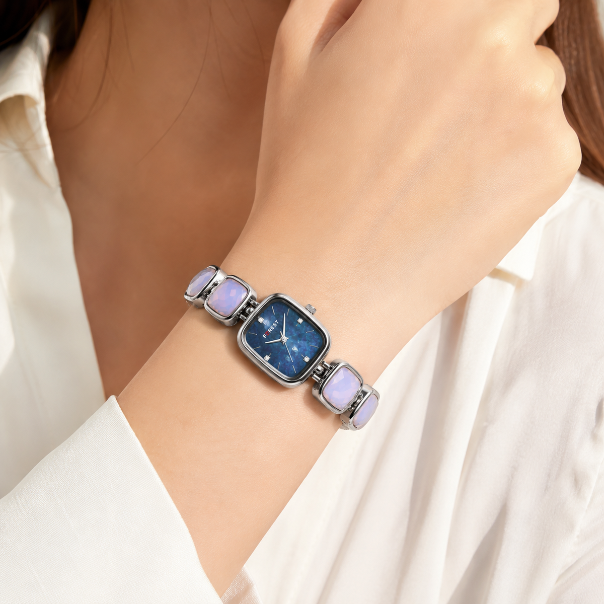 The Women’s Blue Mother of Pearl Dial Bracelet Watch